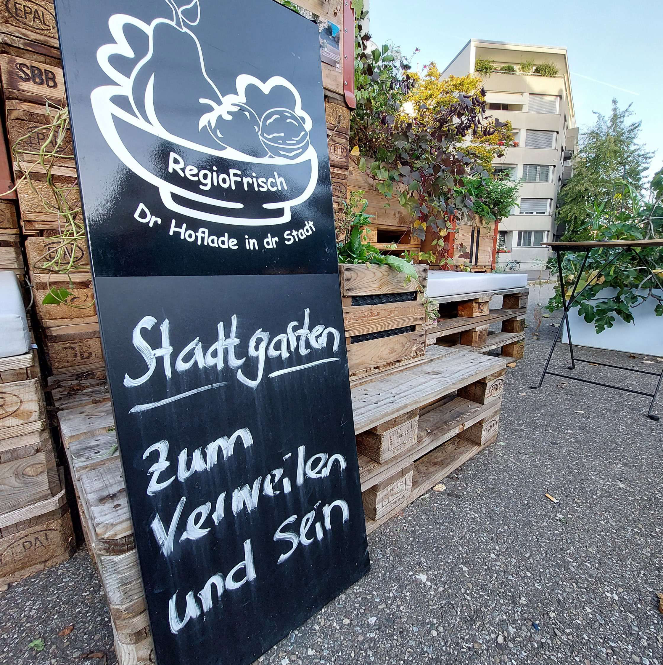 Schild: Stadtgarten, zum verweilen und sein